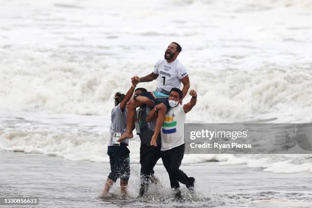 Italo Ferreira of Team Brazil shows emotion after winning the Gold Medal in the men’s Surfing final match against Kanoa Igarashi of Team Japan on day...