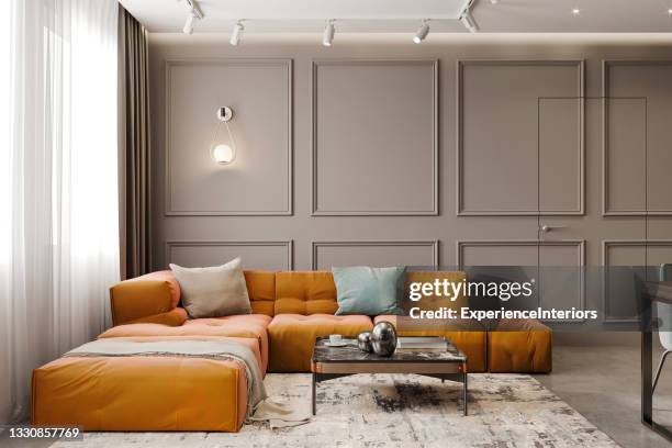 living room with large sofa - moulds stock pictures, royalty-free photos & images
