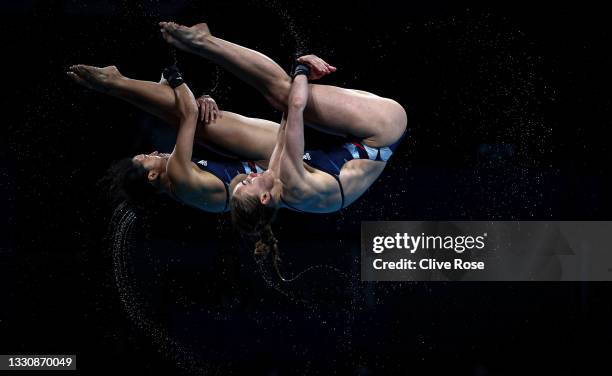 Lois Toulson and Eden Cheng Team of Great Britain compete during the Women's Synchronised 10m Platform Final on day four of the Tokyo 2020 Olympic...