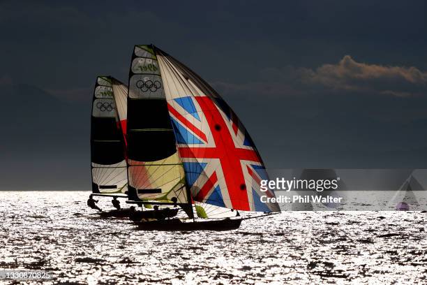 Diego Botin le Chever and Iago Lopez Marra of Team Spain sail alongside Dylan Fletcher and Stuart Bithell of Team Great Britain as they compete on...