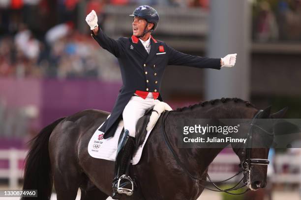 Carl Hester of Team Great Britain riding En Vogue reacts in the Dressage Team Grand Prix Special Team Final on day four of the Tokyo 2020 Olympic...
