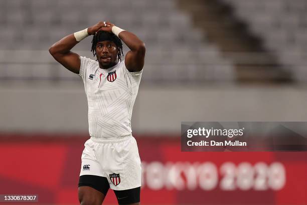 Carlin Isles of Team United States looks dejected at the final whistle during the Rugby Sevens Men's Quarter-final match between Great Britain and...
