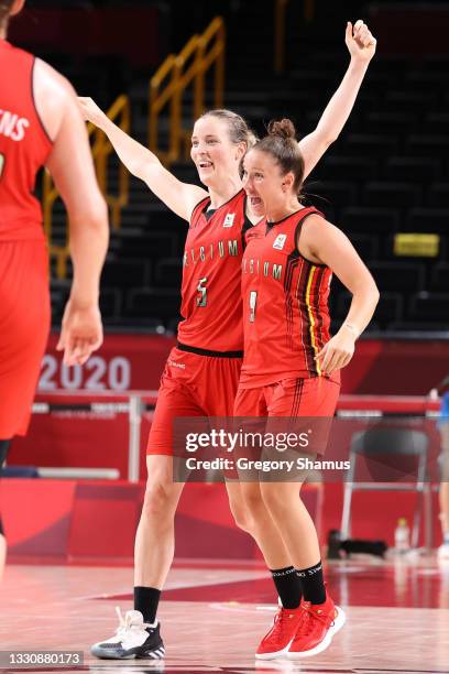 Kim Mestdagh and Marjorie Carpreaux of Team Belgium celebrate Belgium's victory over Team Australia their Women's Preliminary Round Group C game on...