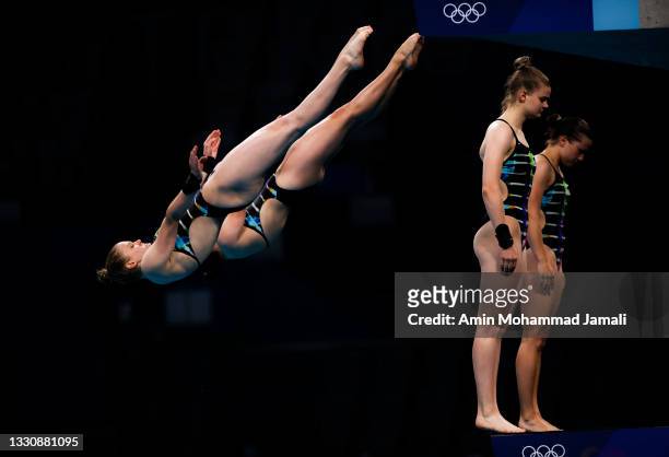 Christina Wassen and Tina Punzel of Team Germany compete during the Women's Synchronised 10m Platform Final on day four of the Tokyo 2020 Olympic...