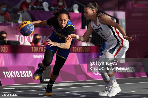 Sonia Ursu of Team Romania handles the ball against Marie-Eve Paget of Team France in the 3x3 Basketball competition on day four of the Tokyo 2020...