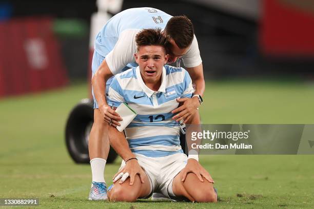 Marcos Moneta and Lucio Cinti of Team Argentina celebrate after their victory during the Rugby Sevens Men's Quarter-final match between South Africa...