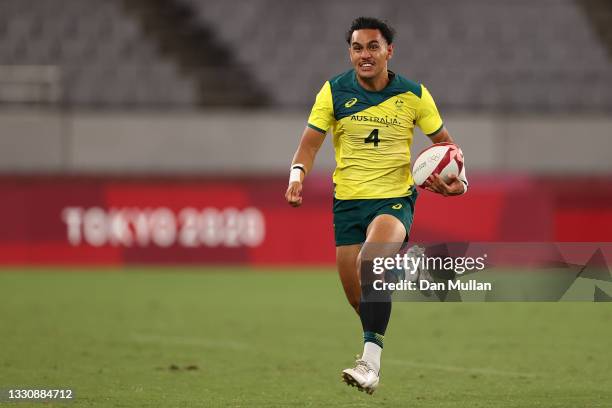 Dietrich Peter Roache of Team Australia in action during the Rugby Sevens Men's Quarter-final match between Australia and Fiji on day four of the...