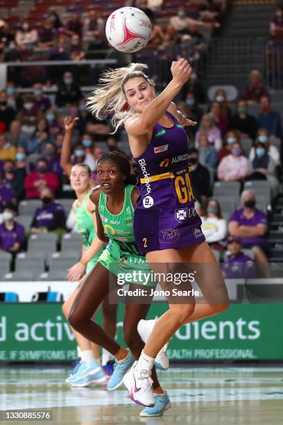 Gretel Bueta of the Firebirds fumbles the ball during the round 12 Super Netball match between West Coast Fever and Queensland Firebirds at Nissan...