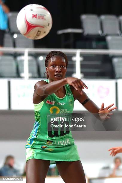 Sunday Aryang of the Fever passes the ball during the round 12 Super Netball match between West Coast Fever and Queensland Firebirds at Nissan Arena,...