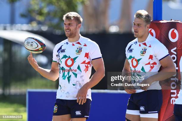 Chris Harris of the British and Irish Lions looks on as he holds a ball during the British & Irish Lions training session at Hermanus High School on...