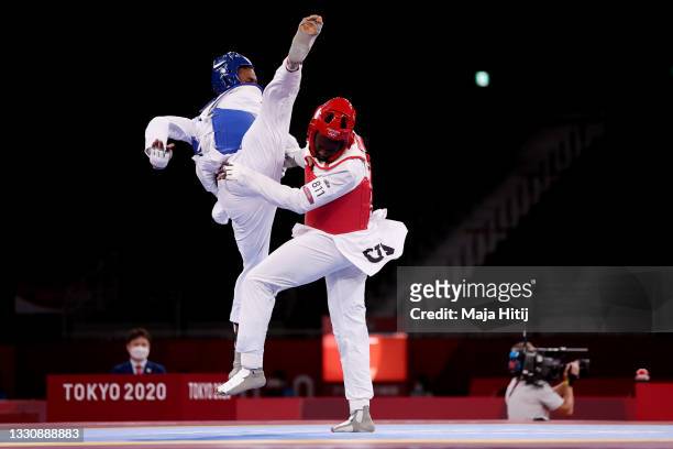 Seydou Gbane of Team Ivory Coast competes against Rafael Yunier Alba Castillo of Team Cuba during the Men's +80kg Taekwondo Repechage contest contest...