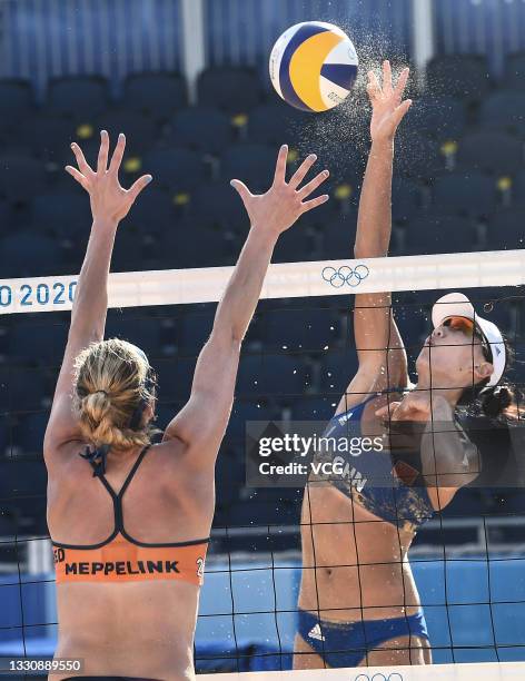 Xue Chen of Team China returns the ball against Madelein Meppelink of Team Netherlands during the Women's Preliminary - Pool B on day four of the...