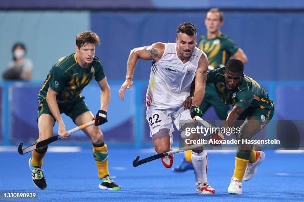 Timothy Drummond and Samkelo Mvimbi of Team South Africa battle for possession with Simon Pierre F Gougnard of Team Belgium during the Men's...