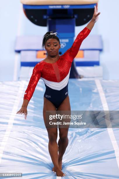 Simone Biles of Team United States reacts after stumbling on her landing while competing on vault during the Women's Team Final on day four of the...