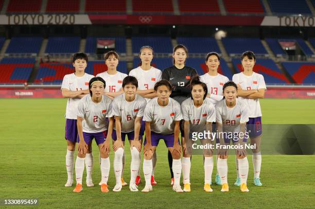 Players of Team China pose for a team photograph prior to the Women's Group F match between Netherlands and China on day four of the Tokyo 2020...