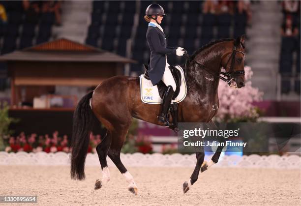 Juliette Ramel of Team Sweden riding Buriel K.H. Competes in the Dressage Team Grand Prix Special Team Final on day four of the Tokyo 2020 Olympic...