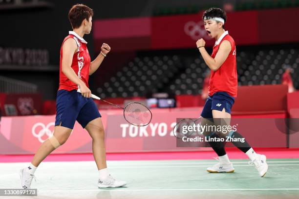 Du Yue and Li Yin Hui of Team China react as they compete against Lee Sohee and Shin Seungchan of Team South Korea during a Women's Doubles Group B...