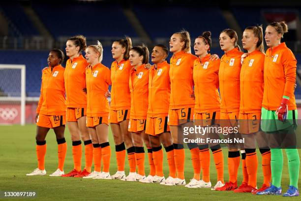 Players of Team Netherlands stand for the national anthem prior to the Women's Group F match between Netherlands and China on day four of the Tokyo...