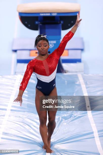 Simone Biles of Team United States reacts after stumbling on her landing while competing on vault during the Women's Team Final on day four of the...