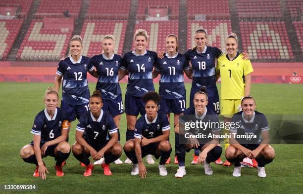 Players of Team Great Britain pose for a team photograph prior to the Women's Group E match between Canada and Great Britain on day four of the Tokyo...