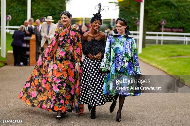 Fashion arrives during the Qatar Goodwood Festival at Goodwood Racecourse on July 27, 2021 in Chichester, England.