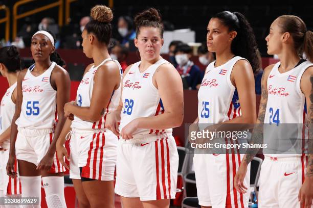 Sabrina Lozada-Cabbage of Team Puerto Rico stands with her teammates for the National Anthem before their game against China in Women's Preliminary...