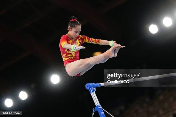 Zhang Jin of Team China competes in the uneven bars during the Artistic Gymnastics Women's Team Final on day four of the Tokyo 2020 Olympic Games at...