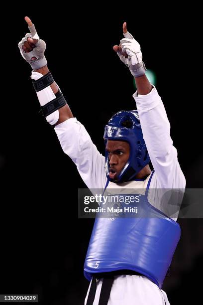 Rafael Yunier Alba Castillo of Team Cuba celebrates after defeating Sun Hongyi of Team China during the Men's +80kg Taekwondo Bronze Medal contest on...