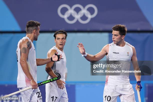 Cedric Daniel Andre Charlier of Team Belgium celebrates with teammates Simon Pierre F Gougnard and Thomas Briels after scoring their team's ninth...