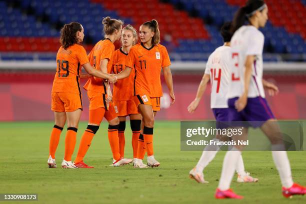 Lieke Martens of Team Netherlands celebrates with teammates after scoring their side's sixth goal during the Women's Group F match between...