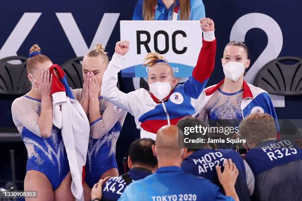 Team ROC celebrates winning the gold medal during the Women's Team Final on day four of the Tokyo 2020 Olympic Games at Ariake Gymnastics Centre on...