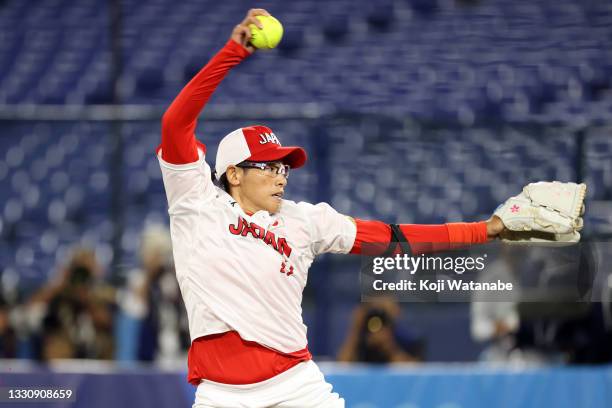 Yukiko Ueno of Team Japan pitches against Team United States during the Softball Gold Medal Game between Team Japan and Team United States on day...