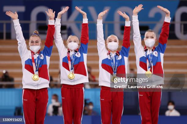 Team ROC celebrates on the podium after winning the gold medal during the Women's Team Final on day four of the Tokyo 2020 Olympic Games at Ariake...