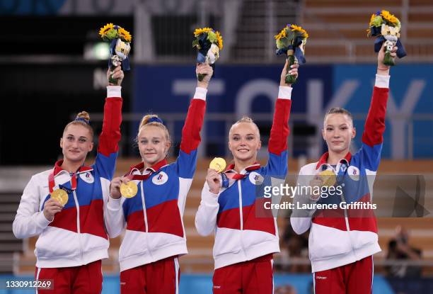 Team ROC celebrates on the podium after winning the gold medal during the Women's Team Final on day four of the Tokyo 2020 Olympic Games at Ariake...