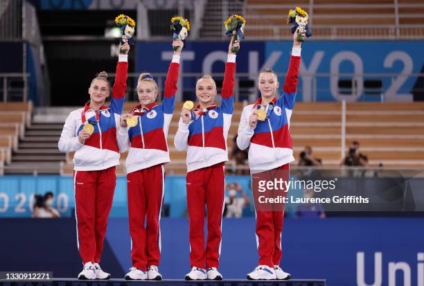 Team ROC celebrates on the podium after winning the gold medal during the Women's Team Final on day four of the Tokyo 2020 Olympic Games at Ariake...