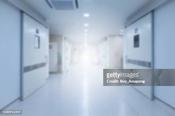 blurred image of corridor to operating room in hospital. - operating room background stock pictures, royalty-free photos & images