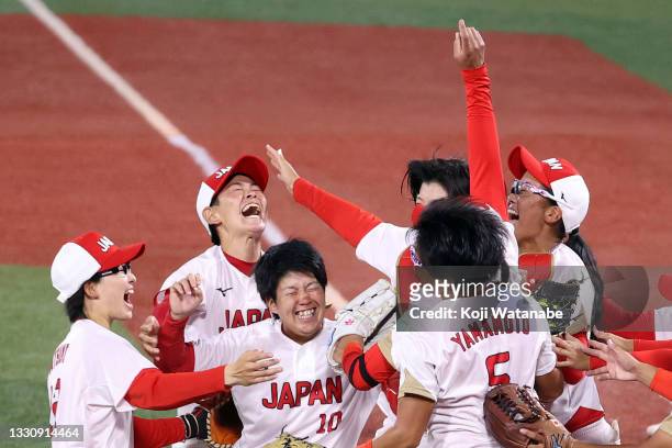 Team Japan celebrates after defeating Team United States 2-0 in the Softball Gold Medal Game between Team Japan and Team United States on day four of...