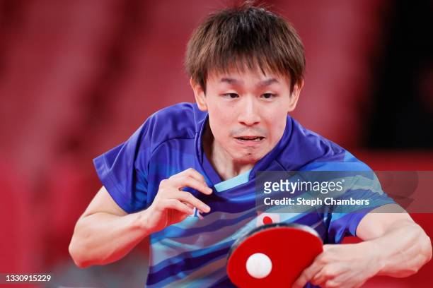 Koki Niwa of Team Japan in action during his Men's Singles Round of 16 match on day four of the Tokyo 2020 Olympic Games at Tokyo Metropolitan...