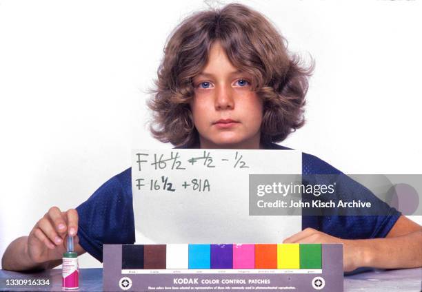 Portrait of American 12-year-old Terry Richardson in a photo studio, New York, New York, 1977. The photo was taken during a lighting test for...