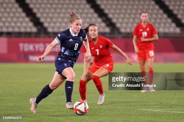 Kim Little of Team Great Britain runs with the ball during the Women's Group E match between Canada and Great Britain on day four of the Tokyo 2020...