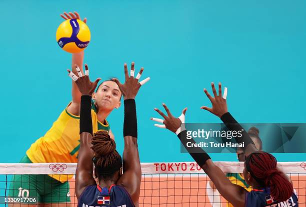 Gabriela Braga Guimaraes of Team Brazil competes against Team Dominican Republic during the Women's Preliminary - Pool A volleyball on day four of...