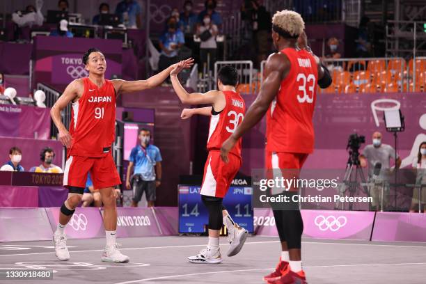 Tomoya Ochiai of Team Japan celebrates in the 3x3 Basketball competition on day four of the Tokyo 2020 Olympic Games at Aomi Urban Sports Park on...