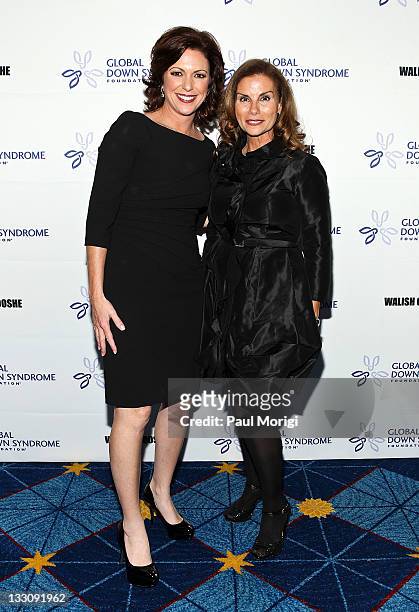 Anchor Kyra Phillips and Lynda Erkiletian of T.H.E. Artist Agency and the Real Housewives of DC arrive at the inaugural 2011 Global Down Syndrome...
