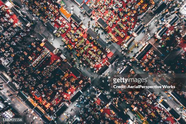 drone point view of night market and crowd of people - beijing city stock pictures, royalty-free photos & images