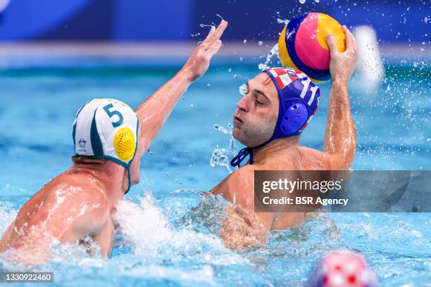 Nathan Power of Team Australia, Paulo Obradovic of Team Croatia during the Men's Water Polo Preliminary Round Group B match between Australia and...