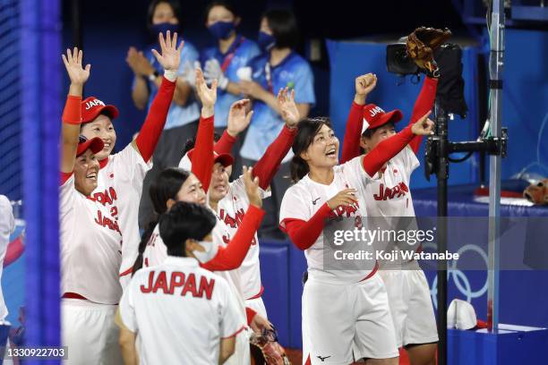 Members of Team Japan celebrates after defeating Team United States 2-0 in the Softball Gold Medal Game between Team Japan and Team United States on...