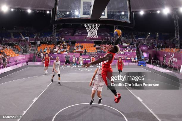 Ira Brown of Team Japan slam dunks the ball in the 3x3 Basketball competition on day four of the Tokyo 2020 Olympic Games at Aomi Urban Sports Park...