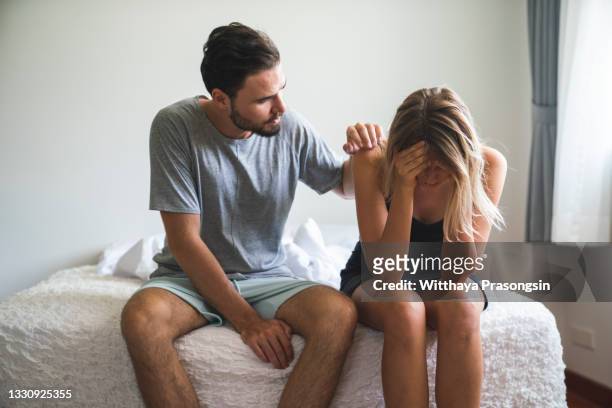 bickering in the bedroom - fighting stock pictures, royalty-free photos & images