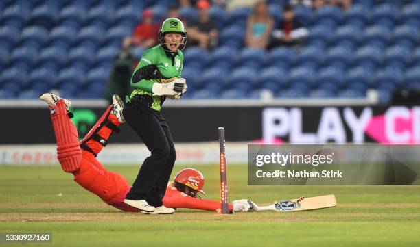 Georgia Redmayne of Welsh Fire Women is run out Carla Rudd of Southern Brave Women during The Hundred match between Welsh Fire Women and Southern...