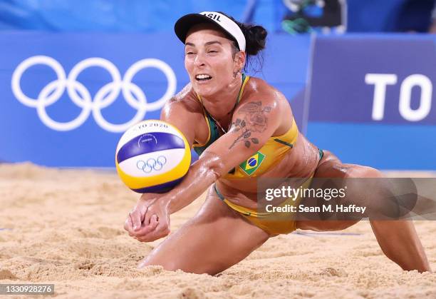 Agatha Bednarczuk of Team Brazil competes against Team China during the Women's Preliminary - Pool C beach volleyball on day four of the Tokyo 2020...